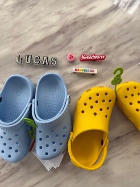 NWT 2 Pairs of CROCS Kids' Clog size C11 and C12 with 8 charms value $120